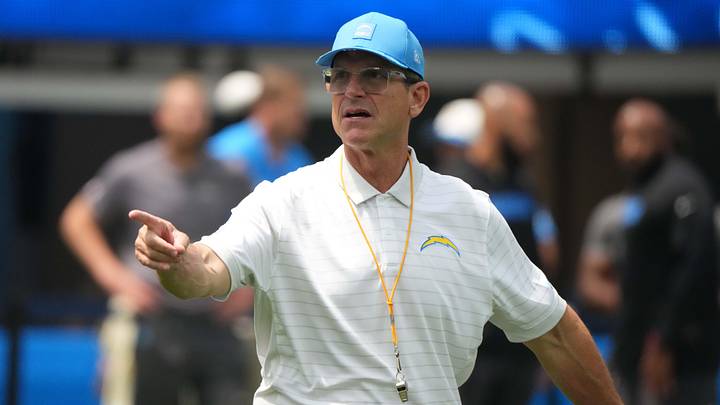 Aug 10, 2025; Inglewood, California, USA; Los Angeles Chargers coach Jim Harbaugh reacts during the game against the New Orleans Saints at SoFi Stadium. Mandatory Credit: Kirby Lee-Imagn Images