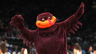 Mar 25, 2023; Seattle, WA, USA; Virginia Tech Hokies mascot HokieBird gestures in the first half against the Tennessee Lady Vols at Climate Pledge Arena. Mandatory Credit: Kirby Lee-Imagn Images