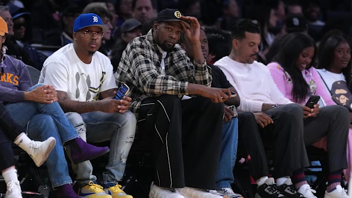 NBA superstar shooter Kevin Durant and Matt Barnes attend the WNBA game between the Chicago Sky and the LA Sparks NBA superstar shooter Kevin Durant and Matt Barnes attend the WNBA game between the Chicago Sky and the LA Sparks