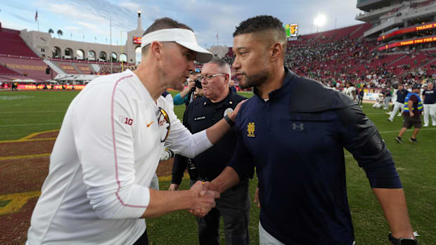 Lincoln Riley and Marcus Freeman meet after the 2024 Notre Dame vs. USC game in Los Angele