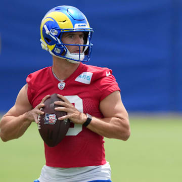 Jun 3, 2025; Woodland Hills, CA, USA; Los Angeles Rams quarterback Stetson Bennett (13) throws the ball during organized team activities at Rams Practice Facility. Mandatory Credit: Kirby Lee-Imagn Images