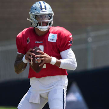 Dallas Cowboys QB Dak Prescott throws the ball at training camp at the River Ridge Fields.