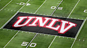 The UNLV Rebels logo at midfield during the Mountain West Championship at Allegiant Stadium. 