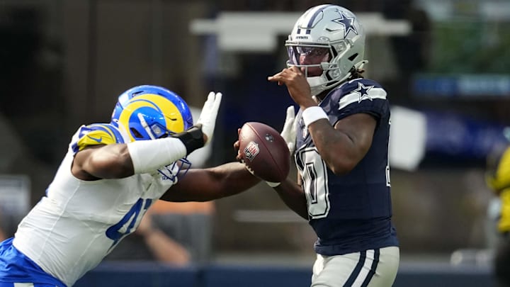 Dallas Cowboys quarterback Joe Milton III is sacked by Los Angeles Rams linebacker Josaiah Stewart Dallas Cowboys quarterback Joe Milton III is sacked by Los Angeles Rams linebacker Josaiah Stewart