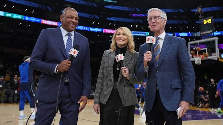 ESPN analysts Doc Rivers, Doris Burke, and play-by-play announcer Mike Breen during the game between the Los Angeles Lakers. ESPN analysts Doc Rivers, Doris Burke, and play-by-play announcer Mike Breen during the game between the Los Angeles Lakers.