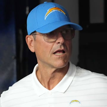 Sep 8, 2024; Inglewood, California, USA; Los Angeles Chargers coach Jim Harbaugh prepares to enter the field before the game against the Las Vegas Raiders at SoFi Stadium. Mandatory Credit: Kirby Lee-Imagn Images