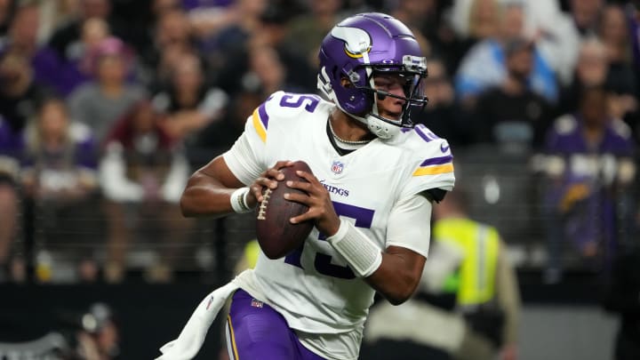 Dec 10, 2023; Paradise, Nevada, USA; Minnesota Vikings quarterback Joshua Dobbs (15) throws the ball against the Las Vegas Raiders in the first half at Allegiant Stadium. Mandatory Credit: Kirby Lee-USA TODAY Sports