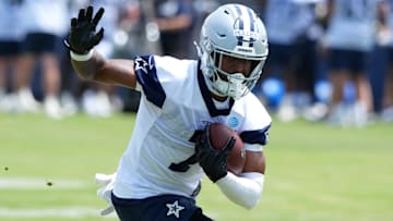 Jul 22, 2025; Oxnard, CA, USA; Dallas Cowboys receiver Traeshon Holden carries the ball during training camp at the River Ridge Fields. Mandatory Credit: Kirby Lee-Imagn Images