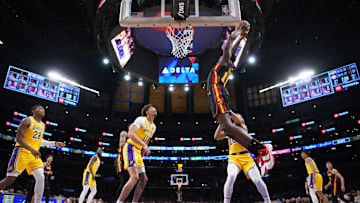 Mar 18, 2024; Los Angeles, California, USA; Atlanta Hawks center Clint Capela (15) dunks the ball against the Los Angeles Lakers in the second half at Crypto.com Arena. Mandatory Credit: Kirby Lee-Imagn Images