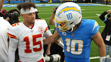 Sep 29, 2024; Inglewood, California, USA; Kansas City Chiefs quarterback Patrick Mahomes (15) and Los Angeles Chargers quarterback Justin Herbert (10) shake hands after the game at SoFi Stadium. Mandatory Credit: Kirby Lee-Imagn Images