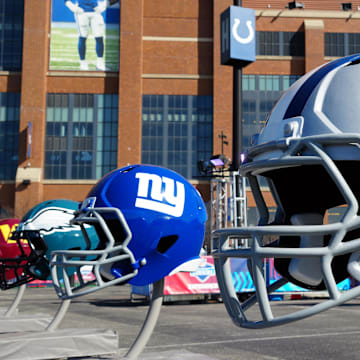 Feb 28, 2024; Indianapolis, IN, USA; A general view of large Dallas Cowboys and New York Giants helmets at the NFL Scouting Combine Experience at Lucas Oil Stadium. Mandatory Credit: Kirby Lee-Imagn Images