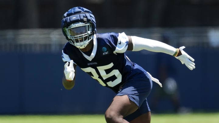 Jul 27, 2023; Oxnard, CA, USA; Dallas Cowboys linebacker DeMarvion Overshown (35) wears a Guardian helmet cap during training camp at Marriott Residence Inn-River Ridge Playing Fields. 