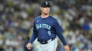 Aug 20, 2024; Los Angeles, California, USA; Seattle Mariners manager Scott Servais (9) reacts during the game against the Los Angeles Dodgers at Dodger Stadium. Mandatory Credit: Kirby Lee-Imagn Images