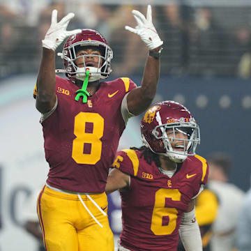 Sep 1, 2024; Paradise, Nevada, USA; Southern California Trojans wide receiver Ja'Kobi Lane (8) and wide receiver Makai Lemon (6 celebrate after a touchdown in the fourth quarter against the LSU Tigers at Allegiant Stadium. Mandatory Credit: Kirby Lee-Imagn Images