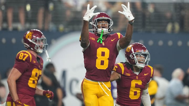 Sep 1, 2024; Paradise, Nevada, USA; Southern California Trojans wide receiver Ja'Kobi Lane (8) and wide receiver Makai Lemon (6 celebrate after a touchdown in the fourth quarter against the LSU Tigers at Allegiant Stadium. Mandatory Credit: Kirby Lee-Imagn Images