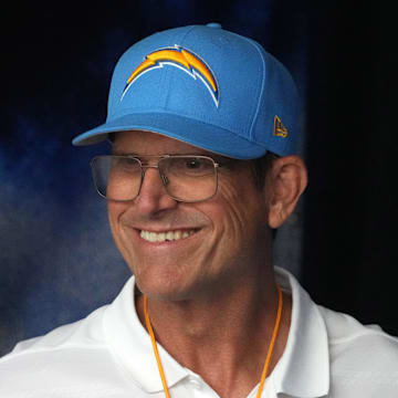 Aug 17, 2024; Inglewood, California, USA; Los Angeles Chargers coach Jim Harbaugh reacts against the Los Angeles Rams in the first half at SoFi Stadium. Harbaugh, a former QB at Palo Alto High School, is one of the 25 new inductees into the California High School Football Hall of Fame. 