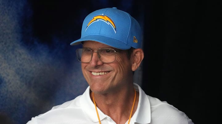 Aug 17, 2024; Inglewood, California, USA; Los Angeles Chargers coach Jim Harbaugh reacts against the Los Angeles Rams in the first half at SoFi Stadium. Harbaugh, a former QB at Palo Alto High School, is one of the 25 new inductees into the California High School Football Hall of Fame. 