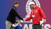 Feb 5, 2023; Paradise, Nevada, USA; NFC captain Eli Manning (left) and AFC captain Peyton Manning shake hands during the Pro Bowl Games at Allegiant Stadium.  