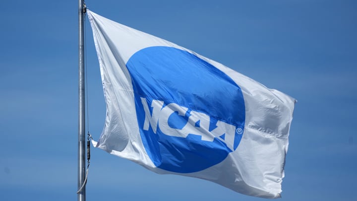 A NCAA logo flag at the NCAA Track and Field Championships at Hayward Field. A NCAA logo flag at the NCAA Track and Field Championships at Hayward Field.