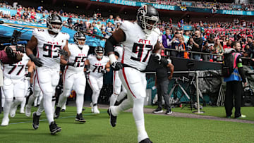 Oct 1, 2023; London, United Kingdom; Atlanta Falcons defensive end Grady Jarrett (97), defensive tackle Calais Campbell (93) and guard Matthew Bergeron (65)enter the field during an NFL International Series game against the Jacksonville Jaguars at Wembley Stadium.