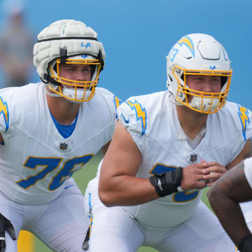 Jun 13, 2024; Costa Mesa, CA, USA; Los Angeles Chargers center Brent Laing (65), offensive tackle Joe Alt (76) and offensive tackle Foster Sarell (73) during minicamp at the Hoag Performance Center. Mandatory Credit: Kirby Lee-USA TODAY Sports