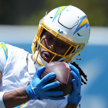 May 29, 2024; Costa Mesa, CA, USA; Los Angeles Chargers wide receiver Quentin Johnston (1) catches the ball during organized team activities at Hoag Performance Center. Mandatory Credit: Kirby Lee-USA TODAY Sports