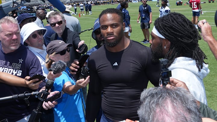 Dallas Cowboys defensive end Micah Parsons and cornerback Trevon Diggs talks to media during NFL training camp