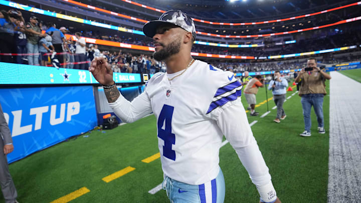 Dallas Cowboys quarterback Dak Prescott walks off the field against the Los Angeles Chargers at SoFi Stadium. Dallas Cowboys quarterback Dak Prescott walks off the field against the Los Angeles Chargers at SoFi Stadium.