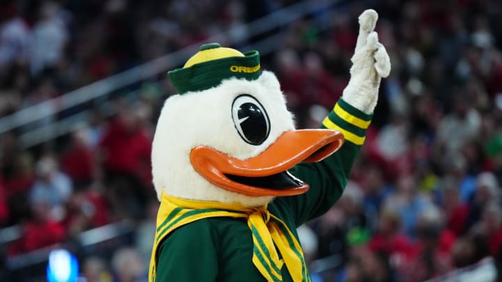 Mar 15, 2024; Las Vegas, NV, USA; The Oregon Ducks mascot gestures during the game against the Arizona Wildcats at T-Mobile Arena.