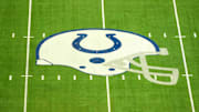 Feb 25, 2025; Indianapolis, IN, USA; The Indianapolis Colts helmet logo at midfield at Lucas Oil Stadium. Mandatory Credit: Kirby Lee-Imagn Images