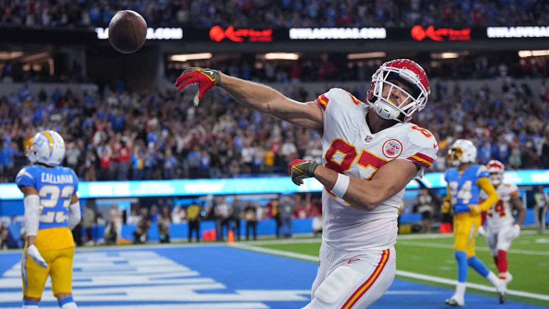 Nov 20, 2022; Inglewood, California, USA; Kansas City Chiefs tight end Travis Kelce (87) celebrates after scoring on a 17-yard touchdown reception with 31 seconds left against the Los Angeles Chargers SoFi Stadium. Mandatory Credit: Kirby Lee-Imagn Images