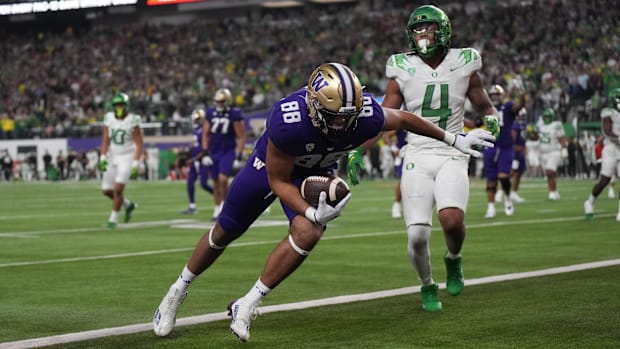 Dec 1, 2023; Las Vegas, NV, USA; Washington Huskies tight end Quentin Moore (88) scores on a 2-yard touchdown reception again