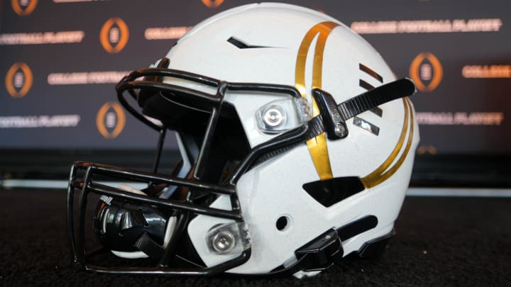 A helmet with the College Football Playoff logo