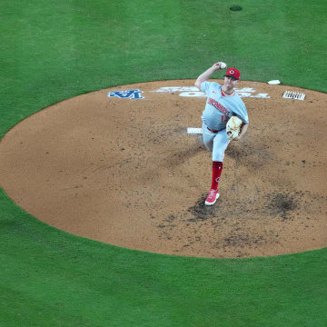 May 16, 2024; Los Angeles, California, USA; Cincinnati Reds pitcher Emilio Pagan (15) throws in the second inning against the Los Angeles Dodgers at Dodger Stadium. Mandatory Credit: Kirby Lee-USA TODAY Sports