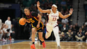 Mar 10, 2024; Las Vegas, NV, USA; Southern California Trojans guard McKenzie Forbes (25) dribbles against Stanford Cardinal guard Chloe Clardy (13) in the second half of the Pac-12 Tournament women's championship game at MGM Grand Garden Arena. Mandatory Credit: Kirby Lee-Imagn Images