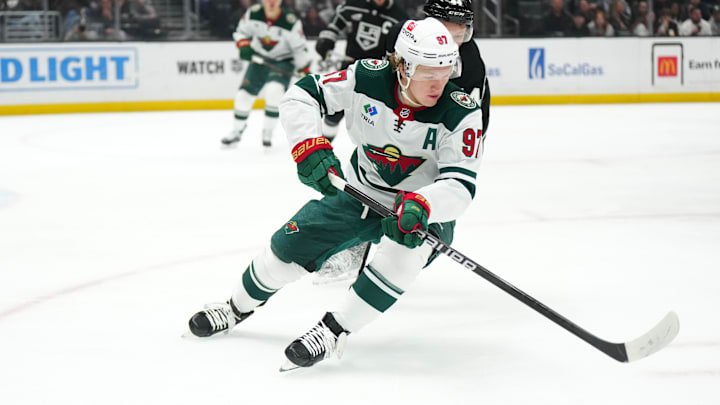 Apr 15, 2024; Los Angeles, California, USA; Minnesota Wild left wing Kirill Kaprizov (97) pursues the puck against LA Kings defenseman Mikey Anderson (44) in the first period at Crypto.com Arena. Mandatory Credit: Kirby Lee-Imagn Images Apr 15, 2024; Los Angeles, California, USA; Minnesota Wild left wing Kirill Kaprizov (97) pursues the puck against LA Kings defenseman Mikey Anderson (44) in the first period at Crypto.com Arena. Mandatory Credit: Kirby Lee-Imagn Images