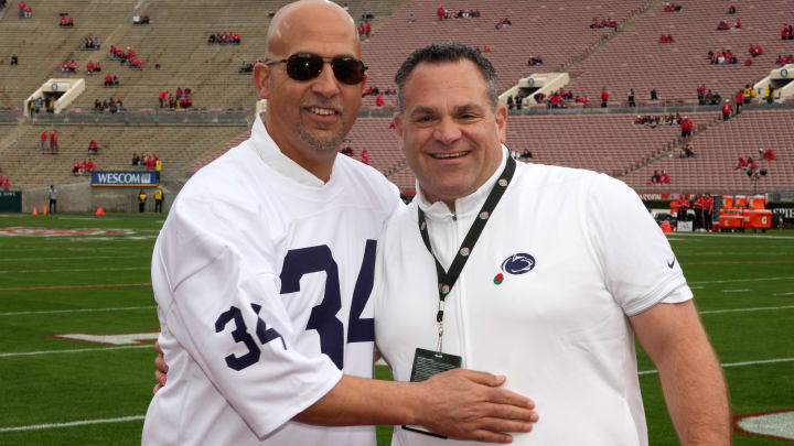 Penn State football coach James Franklin poses for a photo with athletic director Patrick Kraft before the 2024 Rose Bowl.