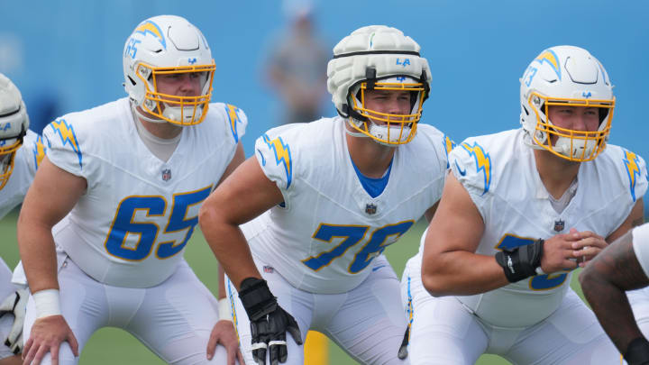 Jun 13, 2024; Costa Mesa, CA, USA; Los Angeles Chargers center Brent Laing (65), offensive tackle Joe Alt (76) and offensive tackle Foster Sarell (73) during minicamp at the Hoag Performance Center. Mandatory Credit: Kirby Lee-USA TODAY Sports