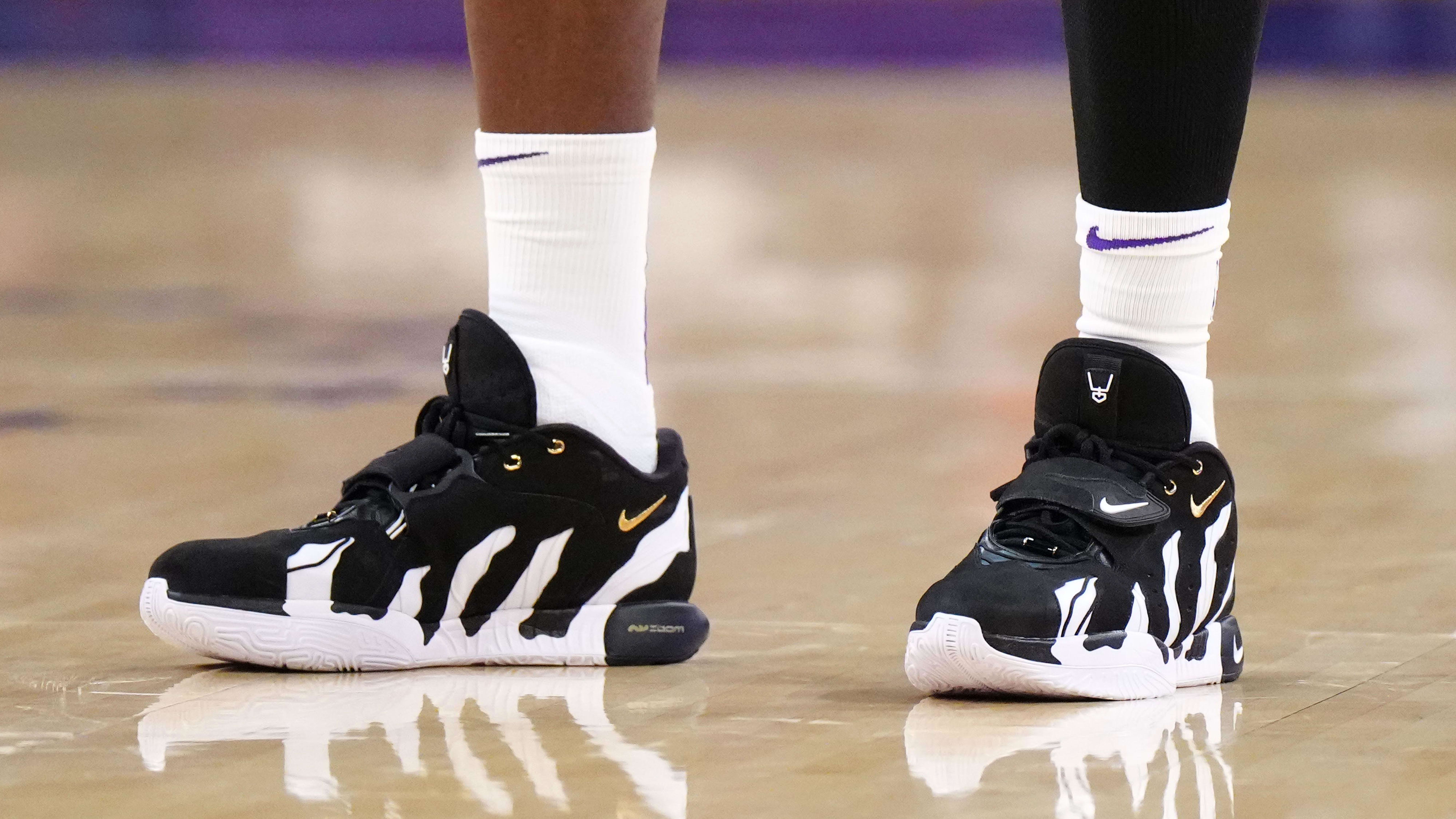 Los Angeles Lakers forward LeBron James' black and white Nike sneakers.