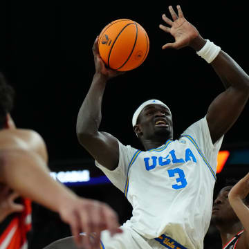 Mar 13, 2024; Las Vegas, NV, USA; UCLA Bruins forward Adem Bona (3) shoots the ball against the Oregon State Beavers in the first half at T-Mobile Arena. Mandatory Credit: Kirby Lee-USA TODAY Sports