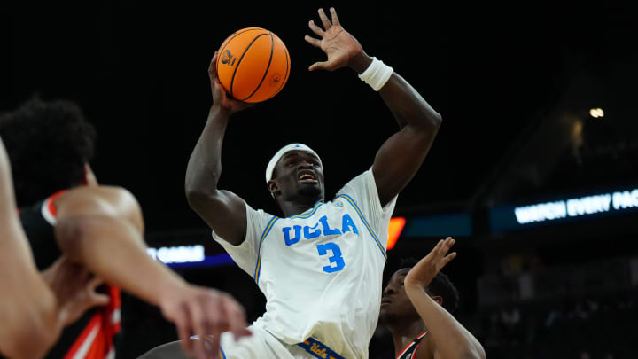 Mar 13, 2024; Las Vegas, NV, USA; UCLA Bruins forward Adem Bona (3) shoots the ball against the Oregon State Beavers in the first half at T-Mobile Arena. Mandatory Credit: Kirby Lee-USA TODAY Sports