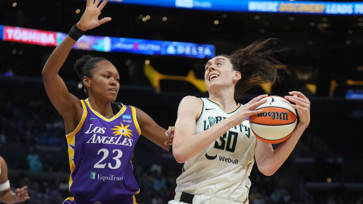 Aug 28, 2024; Los Angeles, California, USA; New York Liberty forward Breanna Stewart (30) is defended by LA Sparks forward Azura Stevens (23) in the first half at Crypto.com Arena. Mandatory Credit: Kirby Lee-USA TODAY Sports