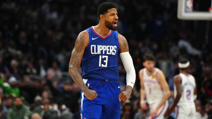 Jan 16, 2024; Los Angeles, California, USA; LA Clippers forward Paul George (13) celebrates against the Oklahoma City Thunder in the second half at Crypto.com Arena. Mandatory Credit: Kirby Lee-USA TODAY Sports