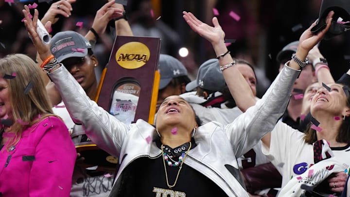 Apr 7, 2024; Cleveland, OH, USA; South Carolina Gamecocks head coach Dawn Staley celebrates after the 2024 NCAA Tournament Women's Final Four championship game against the Iowa Hawkeyes at Rocket Mortgage FieldHouse.  Mandatory Credit: Kirby Lee-Imagn Images