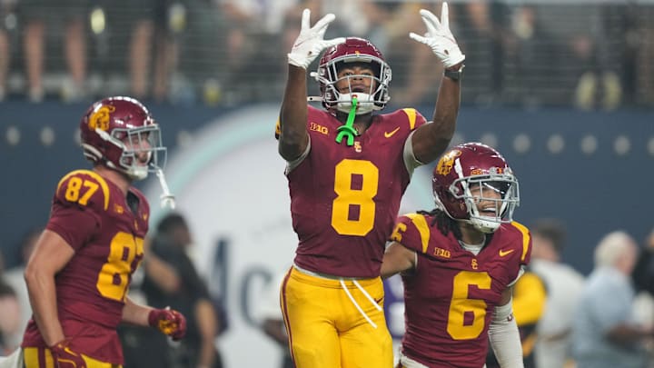 Sep 1, 2024; Paradise, Nevada, USA; Southern California Trojans wide receiver Ja'Kobi Lane (8) and wide receiver Makai Lemon (6 celebrate after a touchdown in the fourth quarter against the LSU Tigers at Allegiant Stadium.