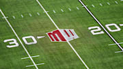 The Mountain West conference logo on the field at Allegiant Stadium. Mandatory Credit: Kirby Lee-Imagn Images