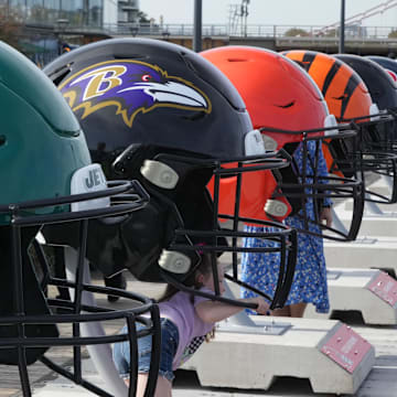 Oct 7, 2023; London, United Kingdom; Large oversized helmets of the New York Jets Baltimore Ravens, Cleveland Browns and Cincinnati Bengals at the NFL Experience London at the Battersea Power Station. Mandatory Credit: Kirby Lee-Imagn Images
