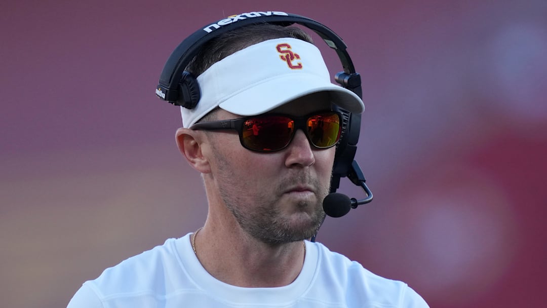 Oct 21, 2023; Los Angeles, California, USA; Southern California Trojans head coach Lincoln Riley watches from the sidelines against the Utah Utes in the first half at United Airlines Field at Los Angeles Memorial Coliseum. 
