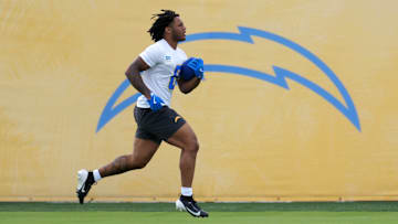 May 12, 2025; El Segundo, CA, USA; Los Angeles Chargers running back Omarion Hampton (8) carries the ball during offseason workouts at The Bolt. Mandatory Credit: Kirby Lee-Imagn Images