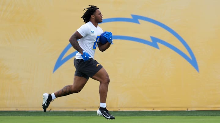 May 12, 2025; El Segundo, CA, USA; Los Angeles Chargers running back Omarion Hampton (8) carries the ball during offseason workouts at The Bolt. Mandatory Credit: Kirby Lee-Imagn Images